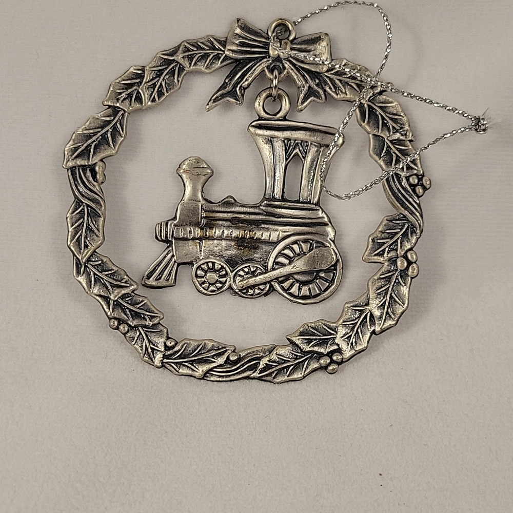 Pewter Wreath With Train Ornament.
